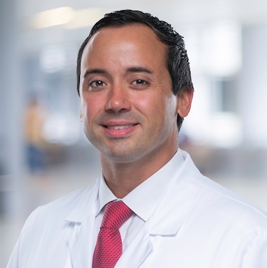 Dr. Gauthier in his white coat